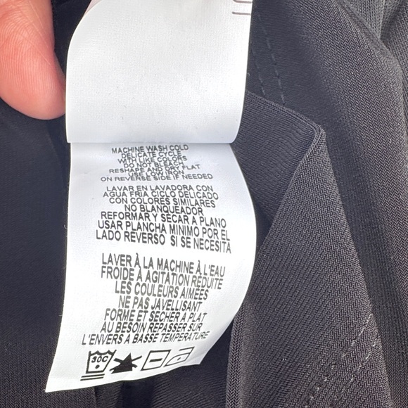 Classic Black Sleeveless Mini Dress with Pearl-Trim Neckline - Picture 9 of 9